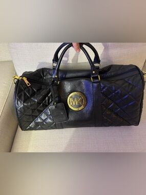 Michael Kors Black Quilted Leather Weekender with Gold MK Medallion
